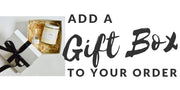 "Add a Gift Box to your order" Gift box with classic black bow, containing an Original Candle, and a match bottle.